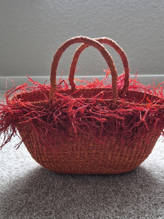 Noname Handbags - Handwoven Straw Tote with Red Fringe Accents